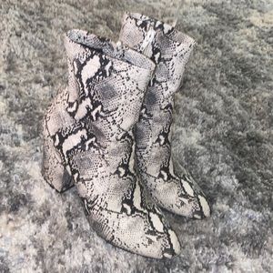 Lightly worn Steve Madden Snakeskin ankle booties